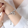 Silver geometric heart bracelet with pavé crystals and adjustable bolo chain closure - Steel