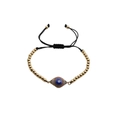 Verstellbares Evil Eye Armband mit blauen Anhängern und Goldperlen auf schwarzer Schnur - Schwarzes Seil mit goldenen Kupferperlen