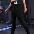 Zwarte yoga-legging met hoge taille en zijzakken in een professionele sportschool - S / Zwart