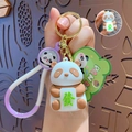 Cute panda keychain with glowing mahjong tile and PANDA wrist strap for bags - Fortune Light Panda - Brown