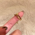 Macro detail of gold-plated nail ring with brown enamel and micro-set zirconia crystals - Nail Design Style (1# Ring-Gold)