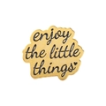 Golden enamel brooch with black lettering enjoy the little things and a small heart icon - Enjoy the little things
