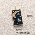 Detailed view of gold rectangle pendant with moon and stars including 28x12mm dimensions - Moon Star Black Rectangle