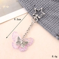Close-up of resin butterfly keychain with star hook measuring 9.5cm and weighing 8.6g - Small Pendant / Purple Butterfly Star Clasp Charm(K4610)