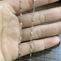 Handheld display of a high-quality silver titanium steel O-chain necklace detail - Silver Lip Chain