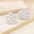 Detailed close-up of silver flower stud earrings with a polished metallic finish - Polished Silver Flower (KE114636-KFC)