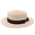 Dettaglio della trama del cappello di paglia con nastro nero e fiocco chic - S (54-56cm) / Rosa