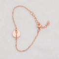 Rose gold chain bracelet with round hollow letter Y pendant on white background - Rose Gold Y