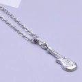 Close-up of a silver stainless steel guitar pendant on an O-chain with high metallic luster - Necklace / Silver