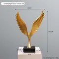 Modern champagne gold resin angel wing sculpture with black base for home decor - 7313D-02 Eagle-Champagne-Small