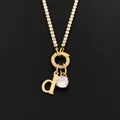 Verfijnde vergulde roestvrijstalen ketting met letter d hanger en ronde kristallen bedel - Letter D (XNL0103) / Goud