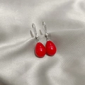 Close-up of elegant red teardrop earrings with silver hooks and sparkling zircon accents - Silver Red Bead Drop Shape Dangle