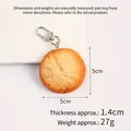 Realistic gold PVC cookie keychain accessory with 5cm diameter and silver metal buckle - Thick Round Cookie Lobster Clasp
