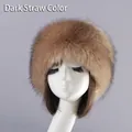 Front view of a thick faux fox fur Russian hat in dark khaki on a model head - Dark Grass