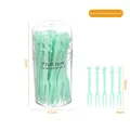 Mint green 50-piece plastic fruit fork set in a clear cylindrical storage container - Bottle Pack/50Pcs / Green