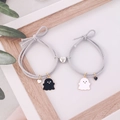 Matching magnetic couple bracelets featuring cute ghost charms and grey braided rope - 1 Pair Pack / Gray