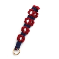 Handmade woven floral charm in red, white and blue with a golden metal clasp - Burgundy
