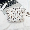 Quilted cotton cosmetic bag in blue plaid with teddy bear patterns and brand label - Skating Dog