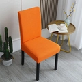 Orange elastic waffle texture chair cover for dining chairs in a cozy home setting - General Specification / Orange