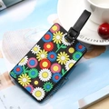 Colorful floral luggage tag with adjustable black strap featuring a embossed sunflower pattern - Sunflower