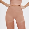 Seamless high-waisted yoga shorts set in cinnamon pink, featuring ribbed compression fabric - Retro Pink