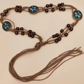 Handmade bohemian braided waist chain with brown wax rope, wood beads and blue stone accents - Oval Flower