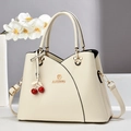 Sac à main élégant en cuir PU blanc cassé pour femme avec design en V et pendentif - Blanc