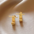 Macro shot of minimalist gold T-shaped earrings on champagne silk fabric background - 2# Silver Post Style (2#)