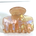 Elegant warm orange marble effect hair claw clip with pearlescent resin finish - Iridescent Orange