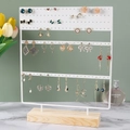 White iron jewelry display rack with a natural wooden base for earrings and necklaces - 144 Holes Large Normal / White