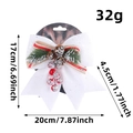 White Christmas bow with pine cones and berries for festive tree decoration - White