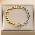 Detail of two-tone gold and silver link bracelet with T-bar clasp and pig-nose chain - 200*9mm