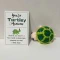 Handmade crochet positive turtle doll with inspirational card on white background - Positive Doll + Card / Green