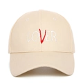 Detail view of the LOSER LOVER embroidery on a beige cotton twill baseball cap - Adjustable / Beige