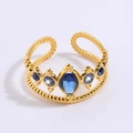 Golden crown ring with blue gemstones and sparkling oval crystal in titanium steel - Crown Blue Stone Style (JZ24-1)