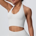 Detail of white halter-neck sports bra with vertical ribbed texture and slim-fit cut - 6703 Vest - Feather Beige / S