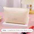 Beige PU leather cosmetic bag with LOVE print measuring 18.5cm x 6.5cm x 12.5cm - Off White