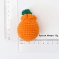 Handmade crochet orange carrot keychain pendant showing size dimensions and weight - Combed Cotton Knitted Tangerine