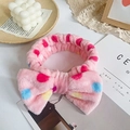Pink plush headband with colorful polka dots and a large bow for washing face - Colorful Polka Dots