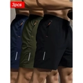 Set di 3 pantaloncini sportivi da uomo in blu navy, oliva e nero con strisce riflettenti - Taglia M / Blu Notte, Verde Militare E Nero
