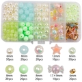 DIY bead kit in green tones with shells and stars in a 10-grid organizer box - Green