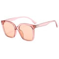 Occhiali da sole quadrati rosa trasparenti con lenti arancioni e dettagli in metallo - Rosa Trasparente (C05)