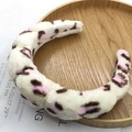 Padded plush headband with pink and brown leopard print pattern on a wooden tray - Plush Leopard Headband / Flannel Beige Leopard