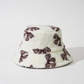 Cappello bucket in lana d'agnello con motivo retrò marrone su bianco per l'inverno - M (56-58cm) / Bianco