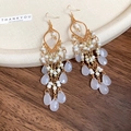 Boucles d'oreilles bohèmes à pompons avec perles blanches et pendentifs violets - 30# Crochet Blanc