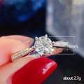 Classic silver six-prong engagement ring with 6mm main stone and pavé diamond band - US 10 / White Gold