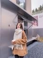 Elegant beige cashmere scarf with tassels worn by model in a stylish outdoor setting - Tassel Style / 260g (200x70cm) / White