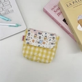 Close-up of quilted yellow plaid mini storage pouch with cute puppy print and blue snap button - Latte Blue Dog