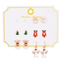 Detail showing 6 pairs of festive Christmas stud earrings on a branded display card - Elk Horn and Angel Style (7375)