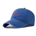 Close-up of royal blue washed cotton baseball cap with red cherry embroidery detail - Lake Blue